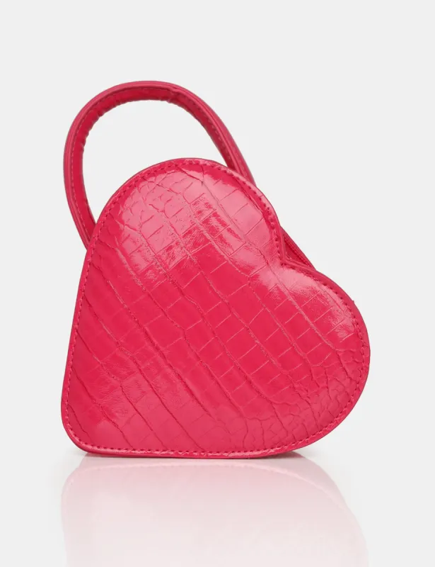 The Roux Bright Pink Croc Heart Grab Bag sold by Public Desire