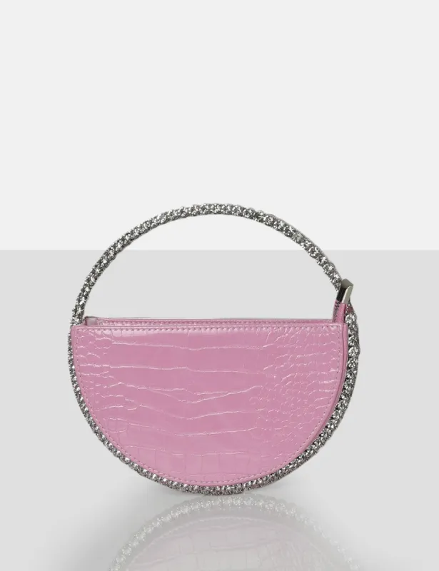 The Alessia Baby Pink Croc Circle Diamante Mini Handbag sold by Public Desire