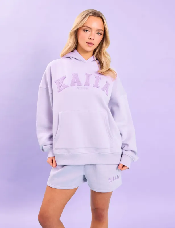 Kaiia Studio Borg Slogan Oversized Hoodie Lilac sold by Public Desire