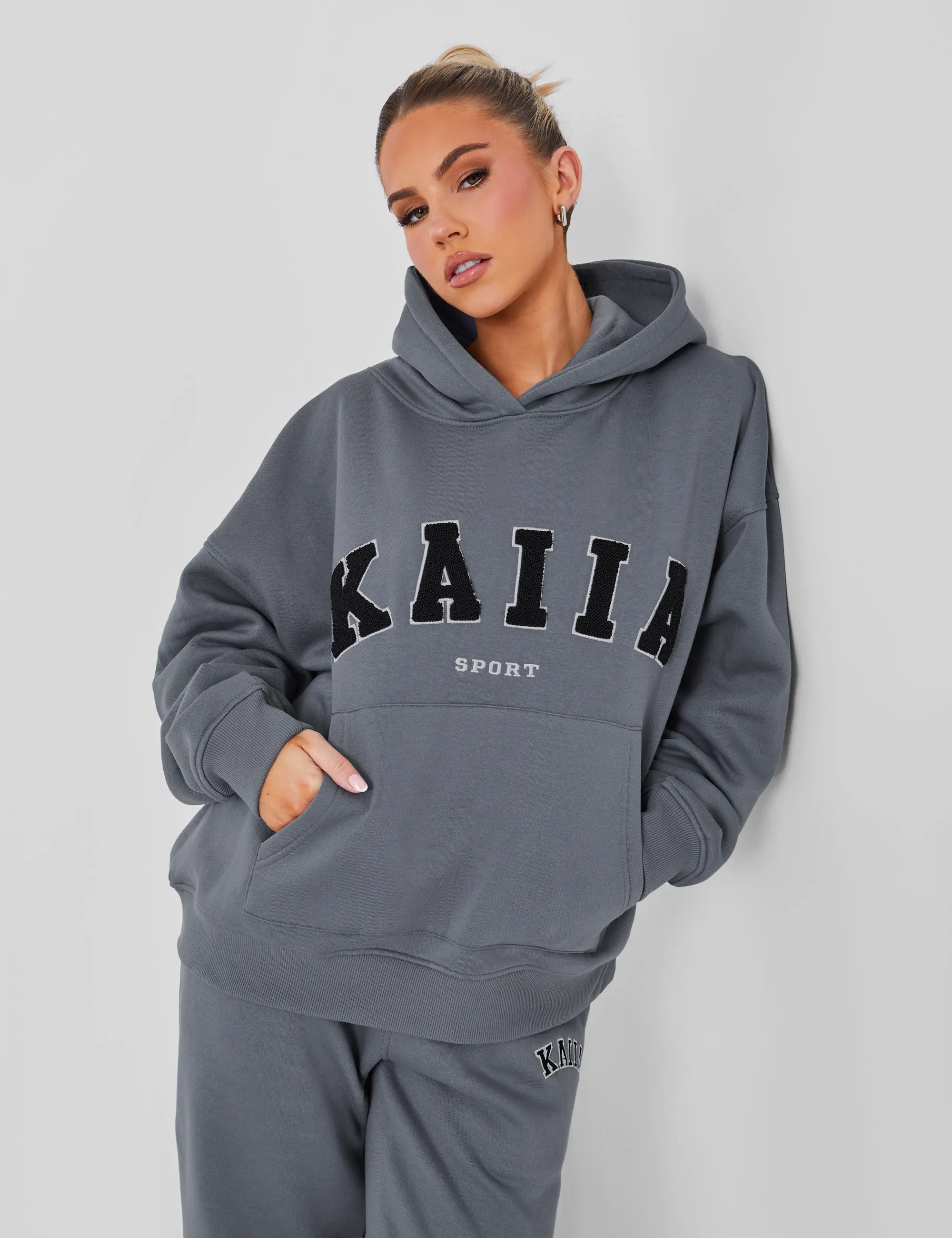 Kaiia Sport Oversized Logo Hoodie in Charcoal Grey sold by Public Desire