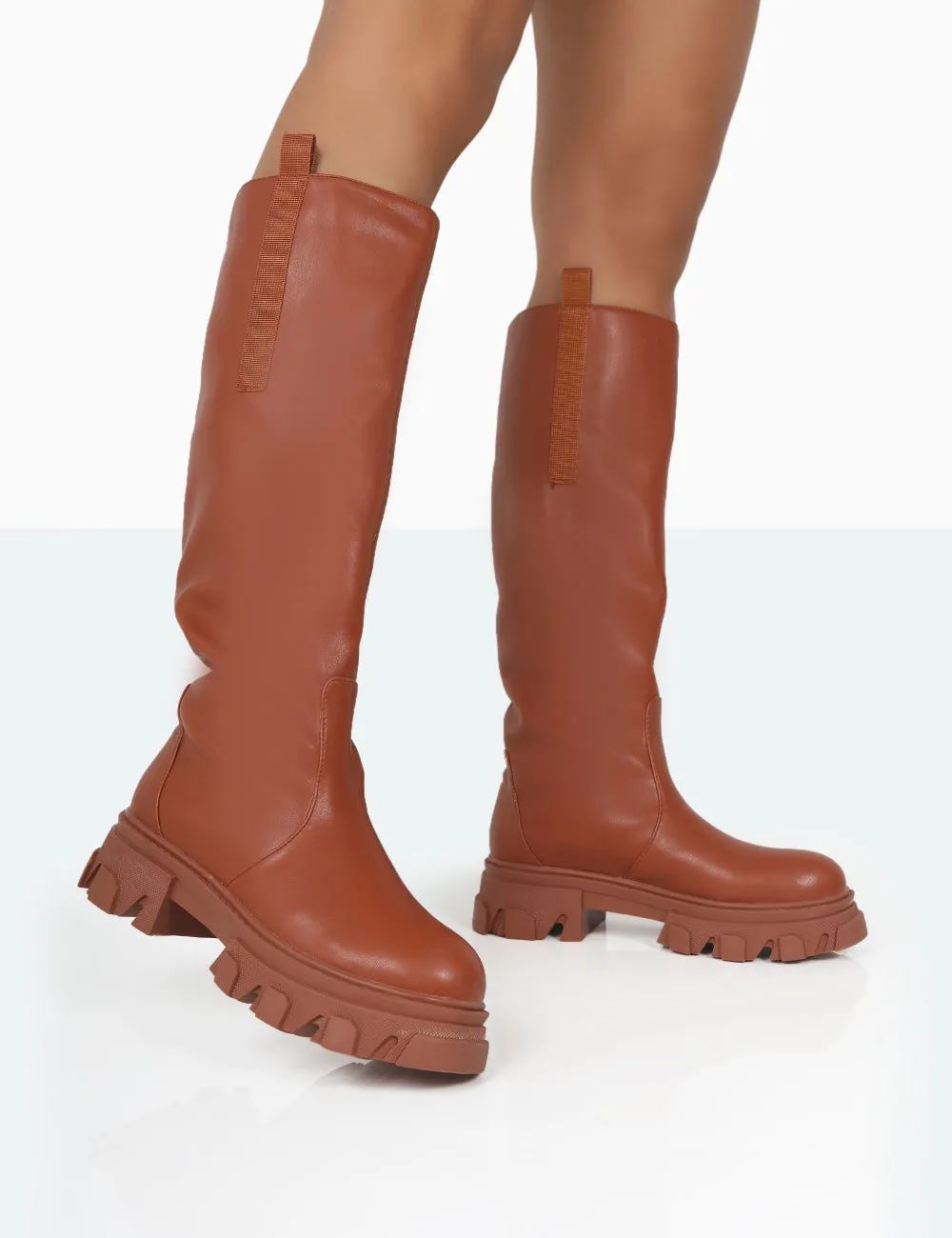 Genius Tabacco Tan Pu Knee High Chunky Sole Boots sold by Public Desire
