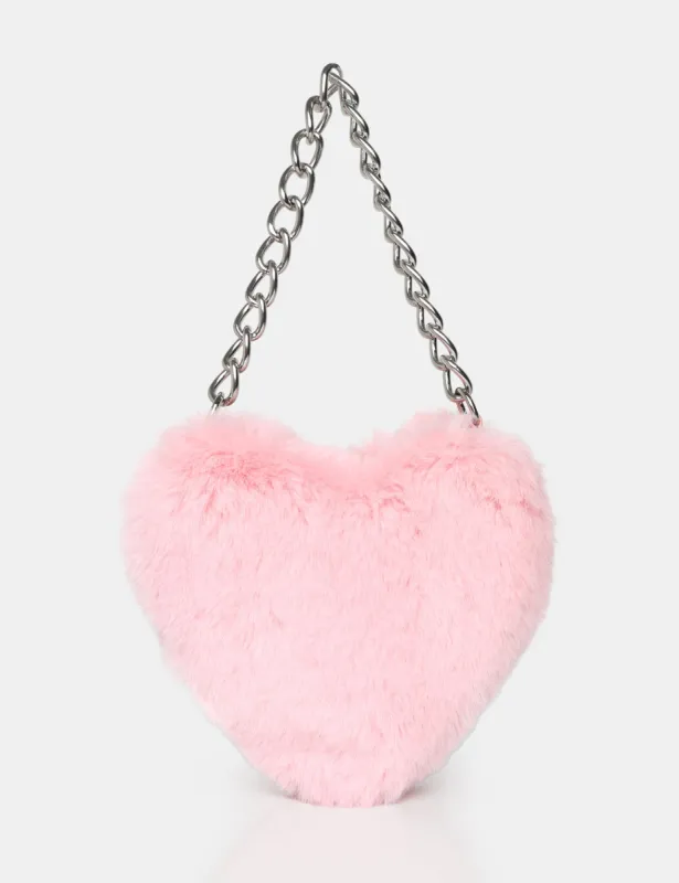 The Anouk Pink Heart Shaped Faux Fur Grab Bag sold by Public Desire