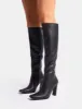 Acquilla Black Knee High Flared Heel Boots sold by Public Desire