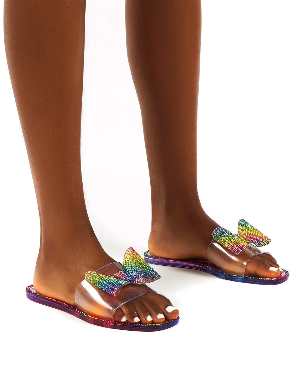 Bobbie Rainbow Multi Perspex Diamante Detail Bow Flat Sandals sold by Public Desire