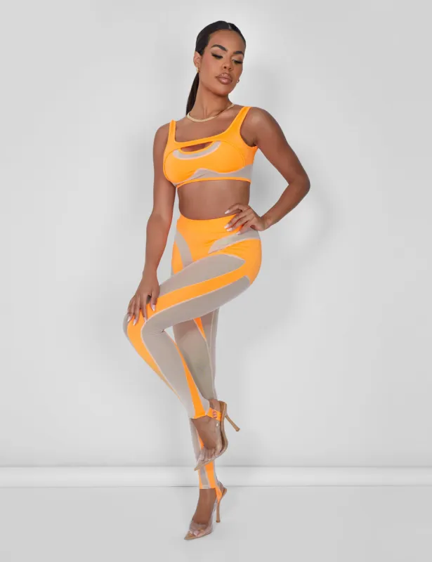 Mesh Insert Leggings Orange sold by Public Desire