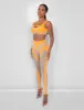 Mesh Insert Leggings Orange sold by Public Desire