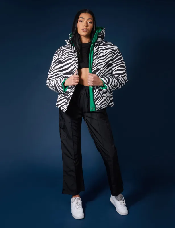 REVERSIBLE QUILTED PUFFER GREEN AND ZEBRA sold by Public Desire