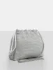 The Claudette Silver Diamante Draw String Crossbody Bag sold by Public Desire