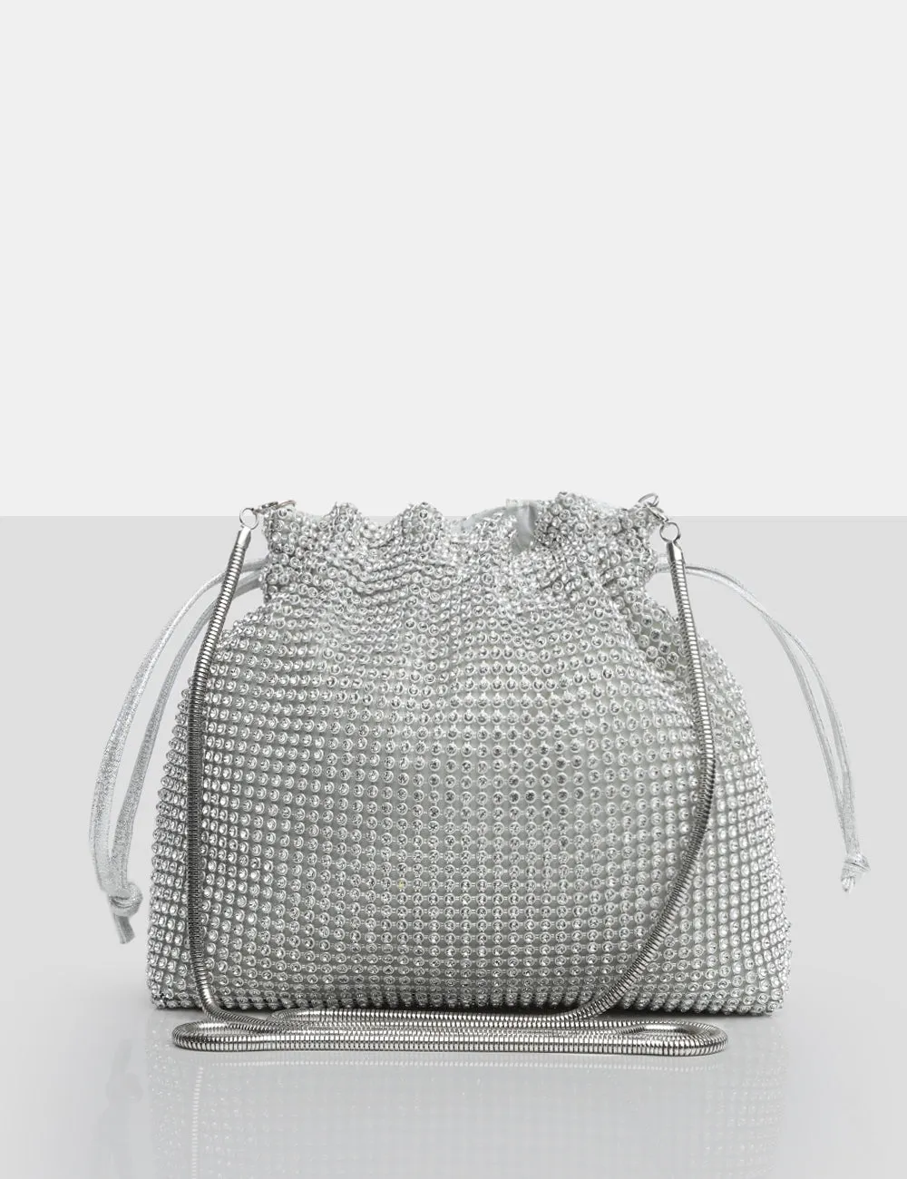 The Claudette Silver Diamante Draw String Crossbody Bag sold by Public Desire