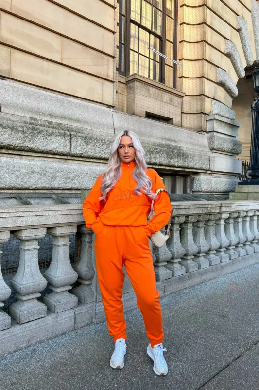 Reverse Panel Relaxed Joggers Orange sold by Public Desire