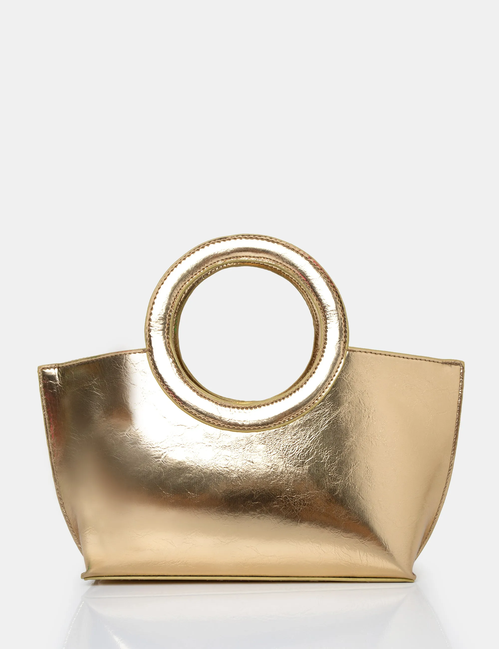 The Rae Gold Circlur Handle Grab Bag sold by Public Desire