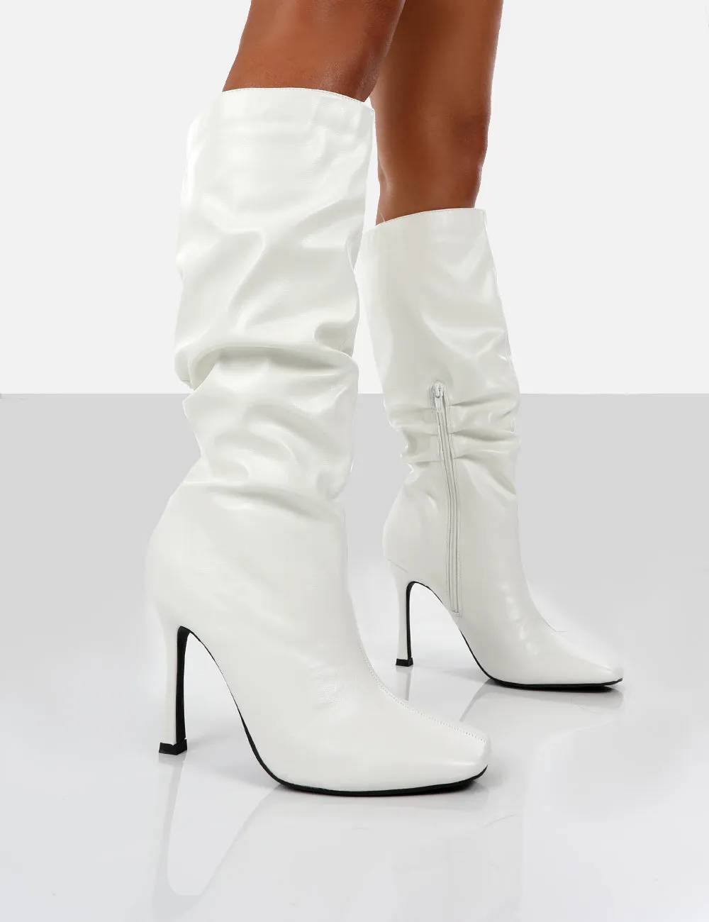 Iris White Pointed Toe Stiletto Heel Knee High Boots sold by Public Desire