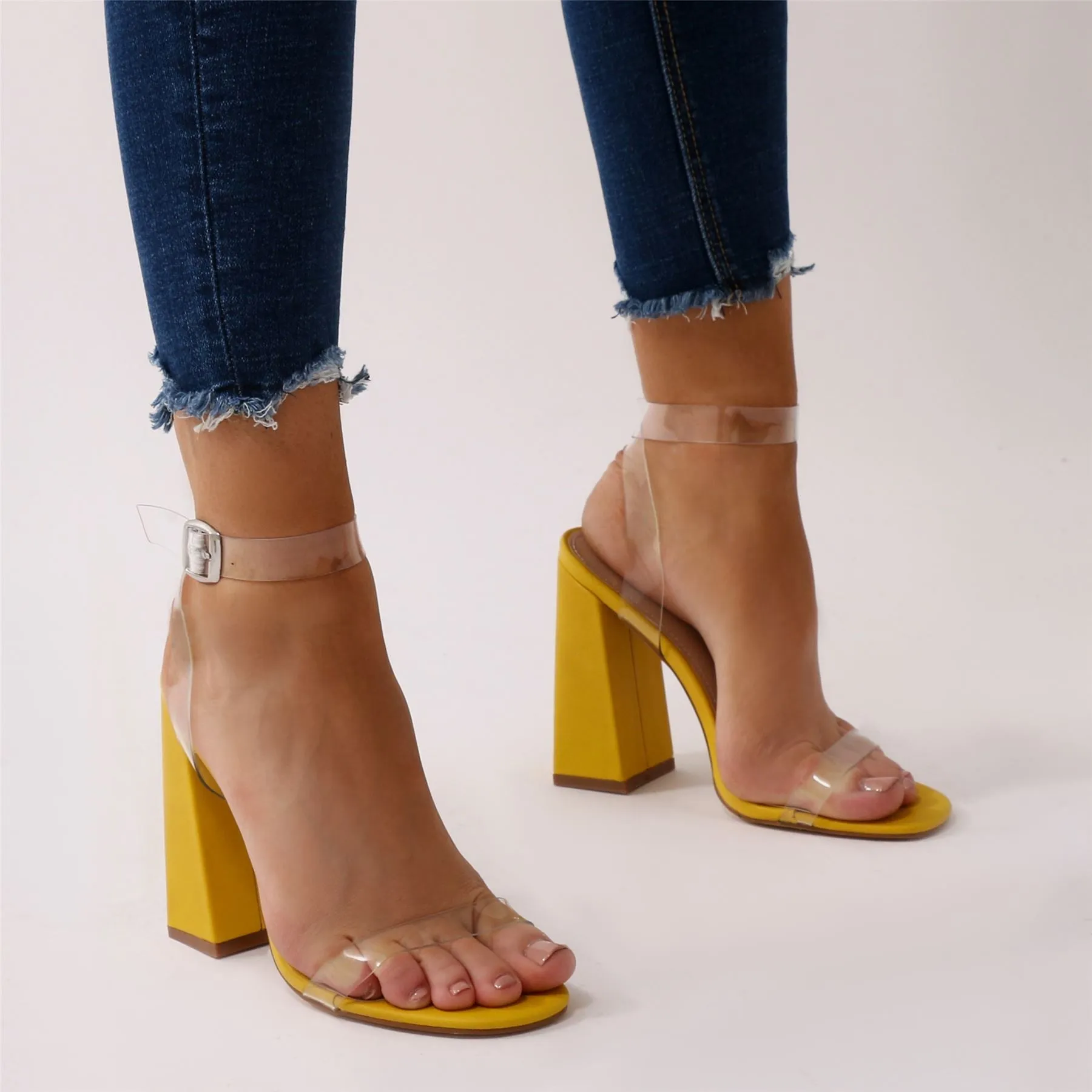 Charlotte Clear Perspex High Heels in Yellow sold by Public Desire