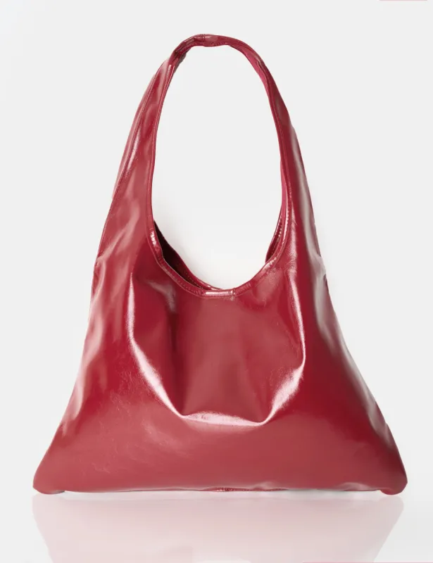The Shadow Burgundy Slouchy Hobo Tote Bag sold by Public Desire