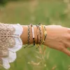 Snake Gold Charm Bracelet sold by Pura Vida