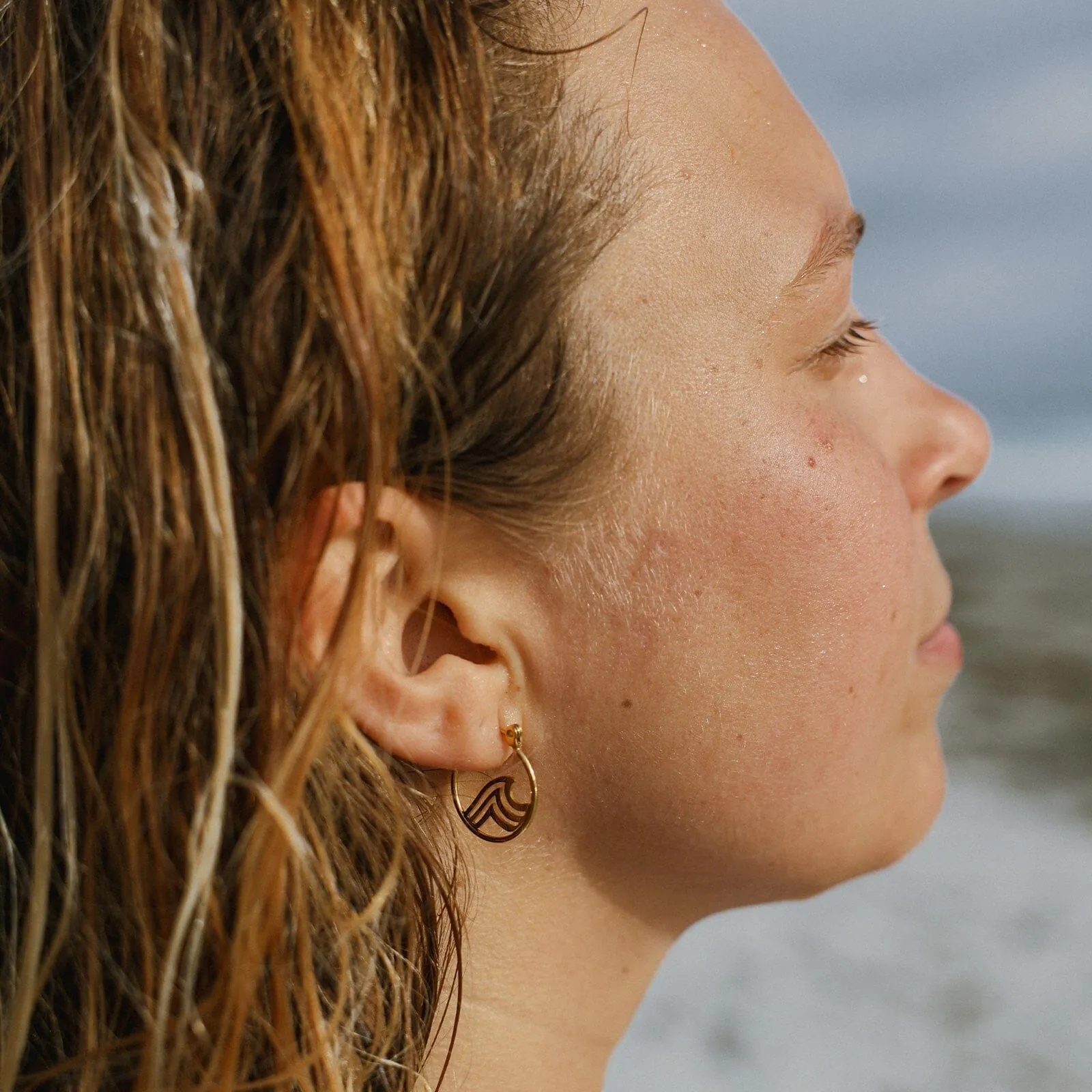 Surfrider Gold Wave Hoop Earrings sold by Pura Vida product image thumbnail 5