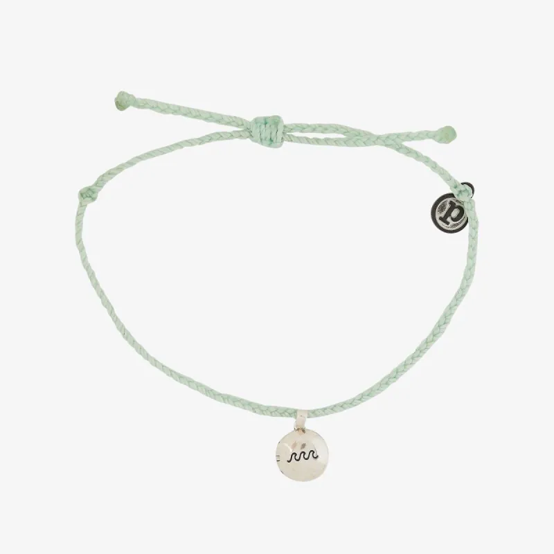 Wave Locket Charm sold by Pura Vida