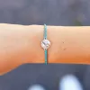 Earth Love Charm sold by Pura Vida