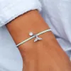 Mermaid Fin Dangling Charm Bracelet sold by Pura Vida