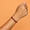 Navy & Orange Bracelet sold by Pura Vida