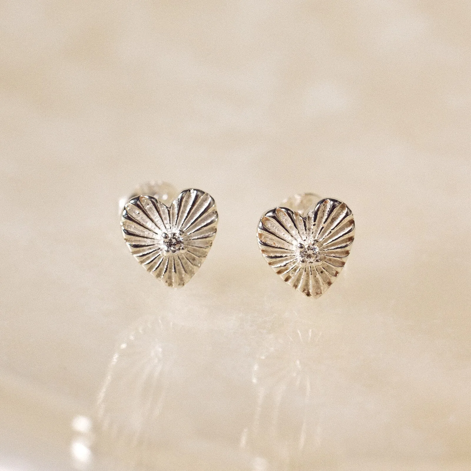 Sunburst Heart Earrings sold by Pura Vida