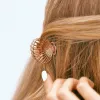 Rose Gold Shell Claw Clip sold by Pura Vida