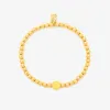 Happy Face Gold Bead Stretch Bracelet sold by Pura Vida