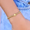 Happy Face Gold Bead Stretch Bracelet sold by Pura Vida