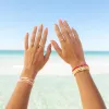 Happy Face Gold Bead Stretch Bracelet sold by Pura Vida