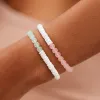 Puka Shell & Frosted Bead Stretch Bracelet sold by Pura Vida