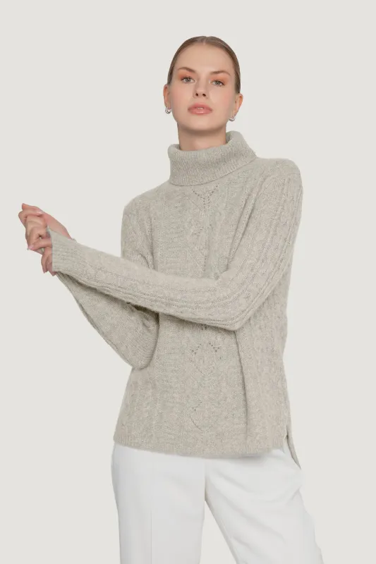 Cashmere Cable Knit Turtleneck sold by Quinn