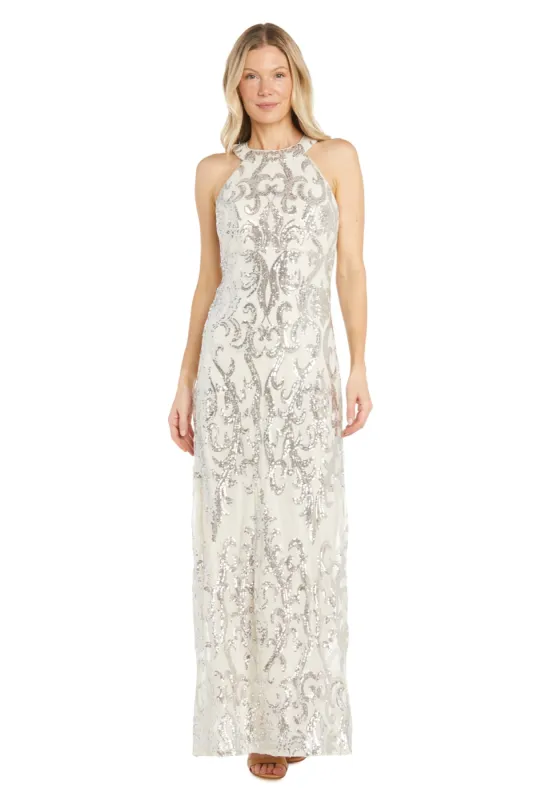 Long Dress Featuring an Ivory Base Embellished with Shimmering Silver Sequins sold by R&M Richards