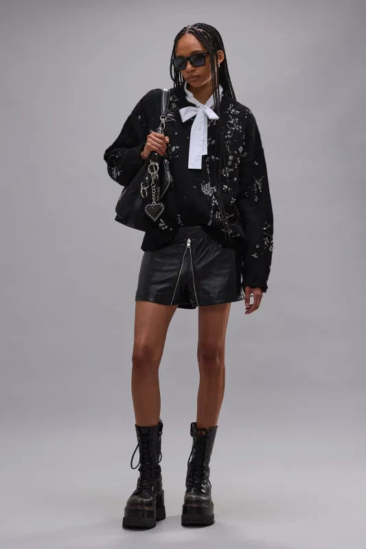 DISTRESSED OVERSIZED SWEATER WITH CRYSTALS AND PINS - BLACK sold by R13