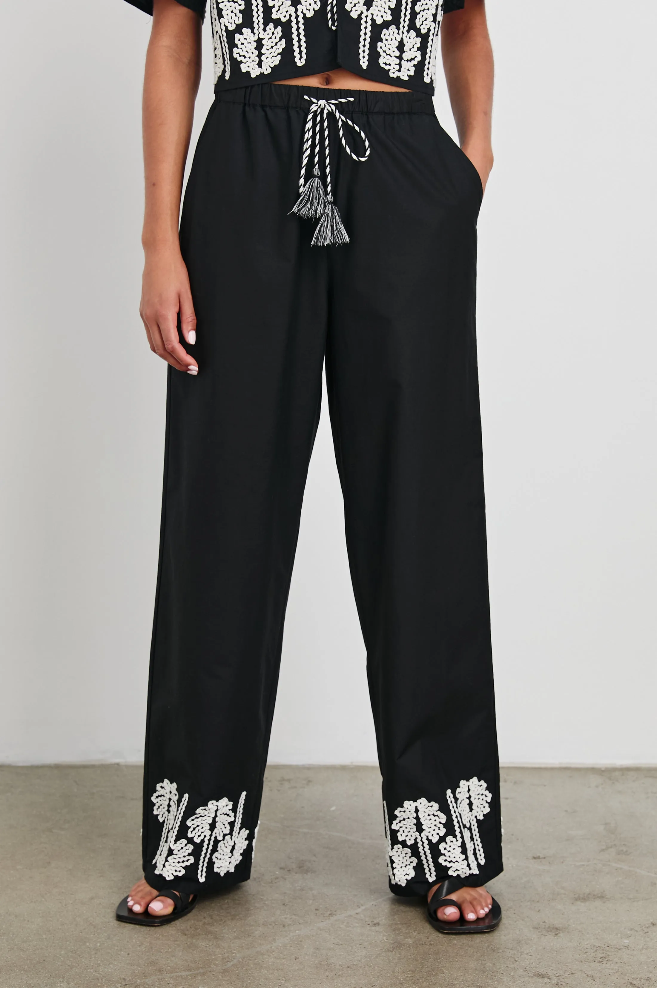 EMMIE PANT - BLACK IVORY PALM TREES sold by Rails