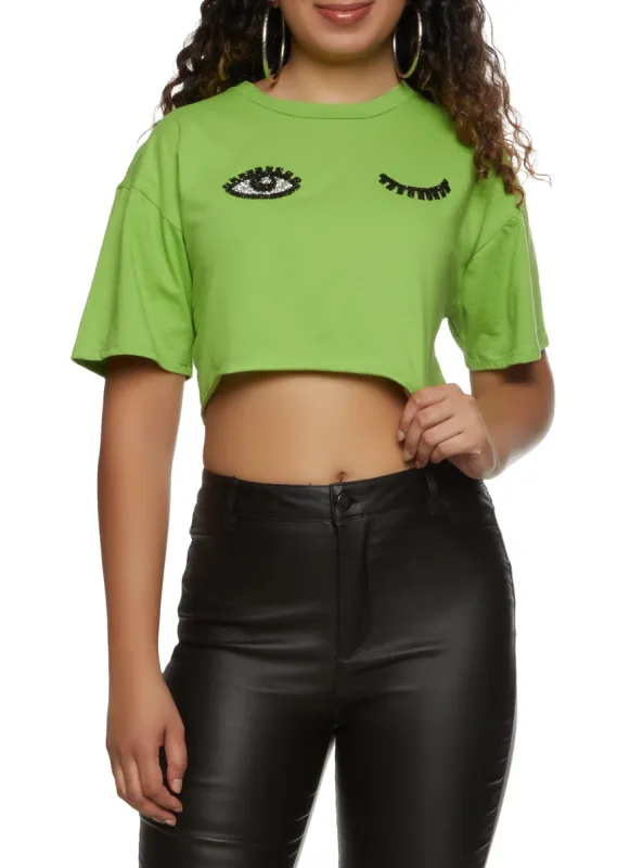 Wink Eyelash Rhinestone Cropped Graphic Tee sold by Rainbow
