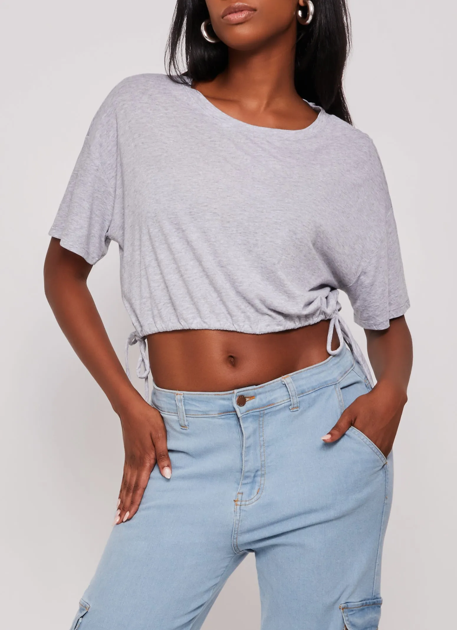 Solid Crew Neck Drawstring Hem Top sold by Rainbow
