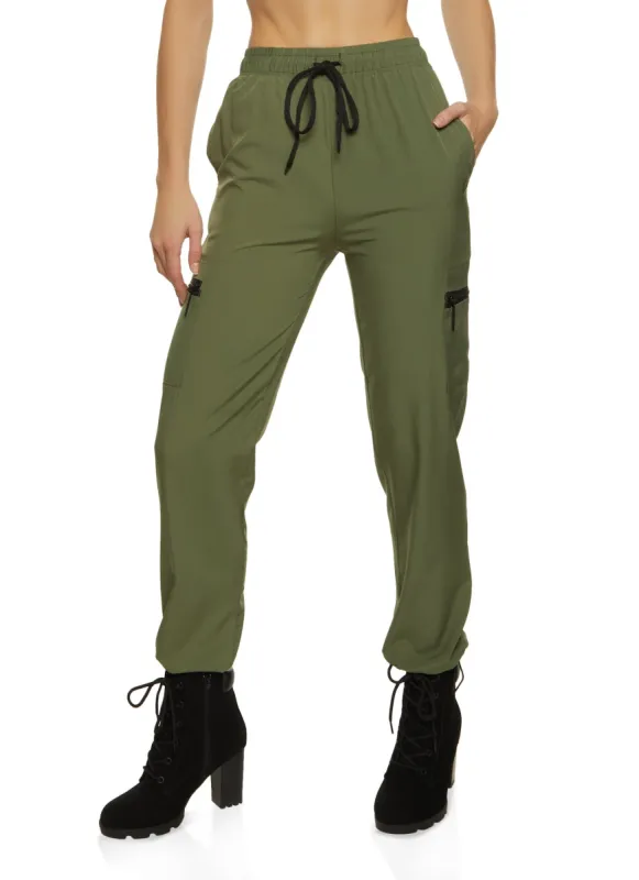 Solid Zip Pocket Parachute Joggers sold by Rainbow