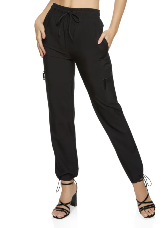 Solid Zip Pocket Parachute Joggers sold by Rainbow