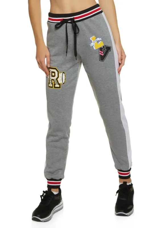 Fleece Graphic Varsity Joggers sold by Rainbow