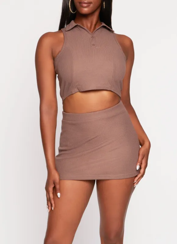 Textured Knit Sleeveless Polo Shirt sold by Rainbow