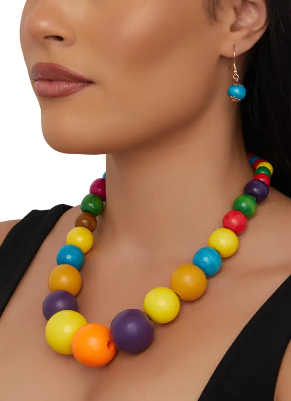 Chunky Wooden Beaded Necklace and Drop Earrings sold by Rainbow