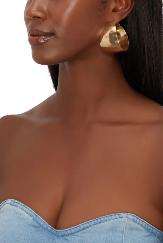 Wide Metallic Hoop Earrings sold by Rainbow