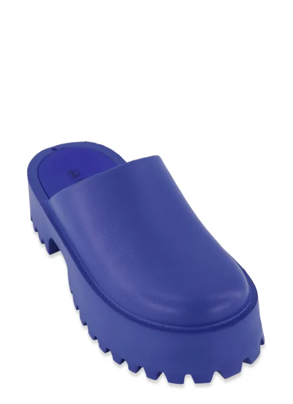 Platform Mule Clogs sold by Rainbow