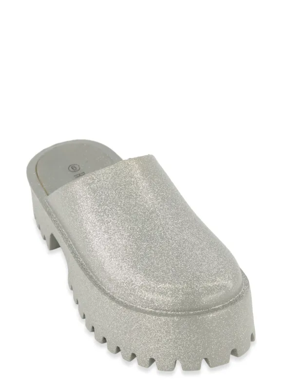 Platform Mule Clogs sold by Rainbow