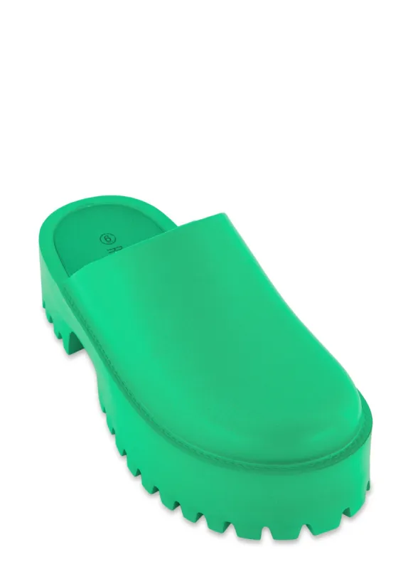 Platform Mule Clogs sold by Rainbow