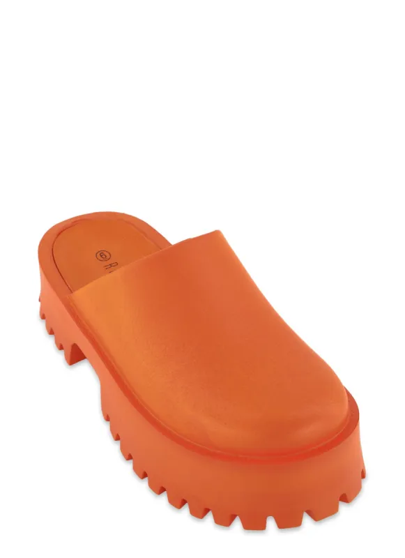 Platform Mule Clogs sold by Rainbow