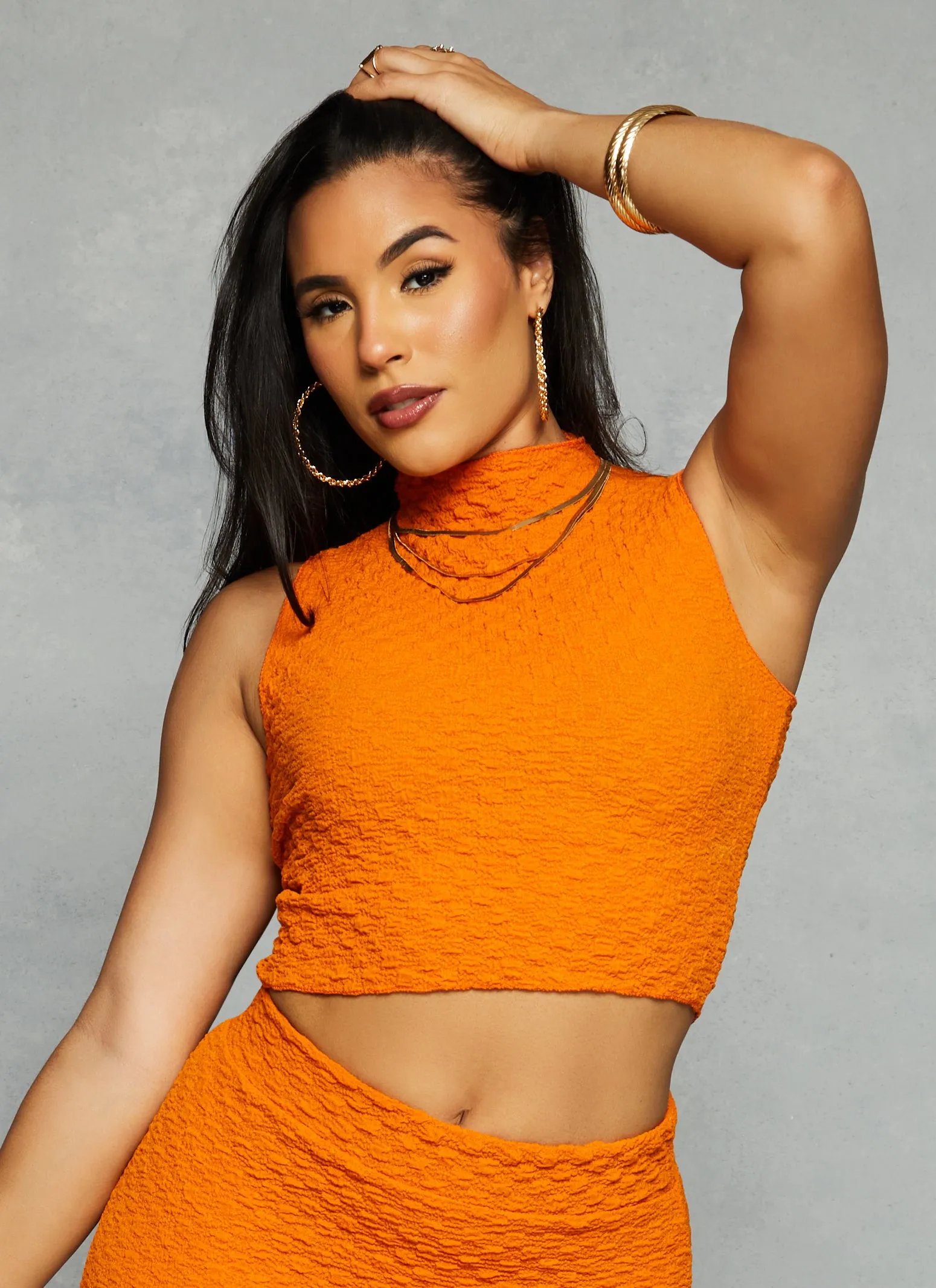 Textured Knit Mock Neck Tank Top sold by Rainbow