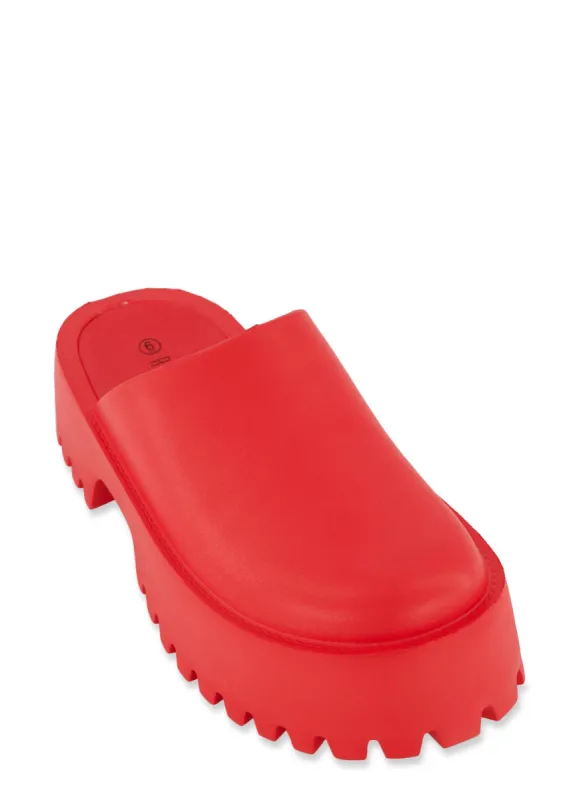 Platform Mule Clogs sold by Rainbow