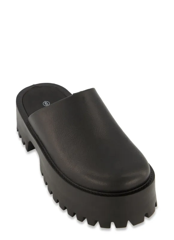 Platform Mule Clogs sold by Rainbow