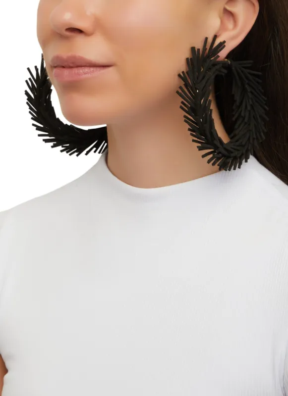Faux Suede Fringed Hoop Earrings sold by Rainbow